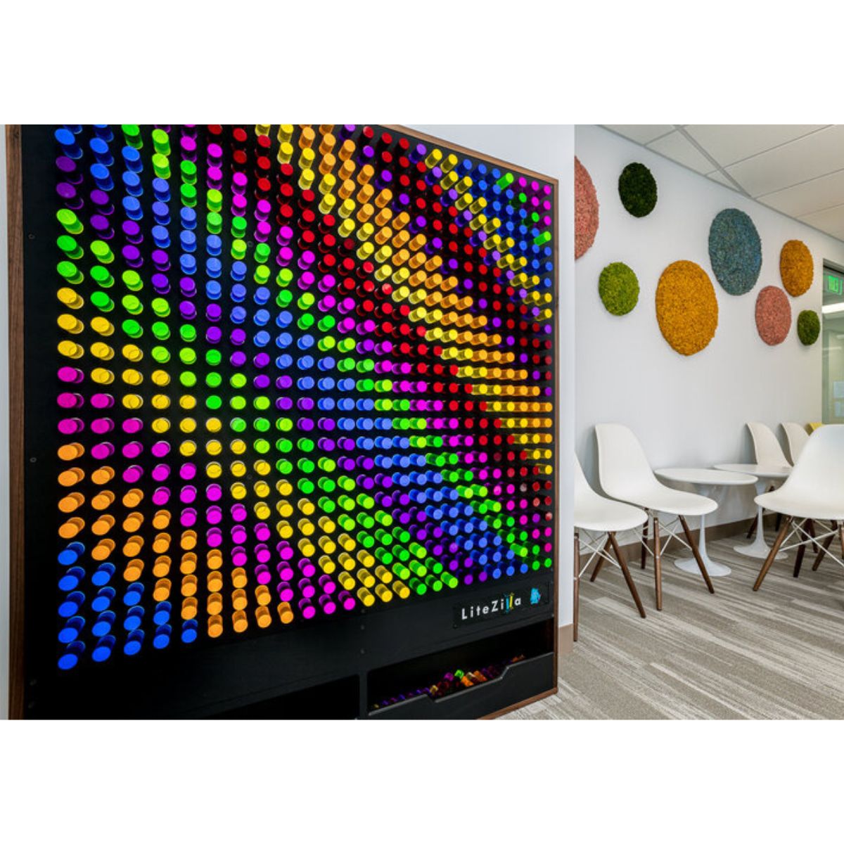 6x5 LiteZilla Lite Brite Giant Wall in room next to chairs