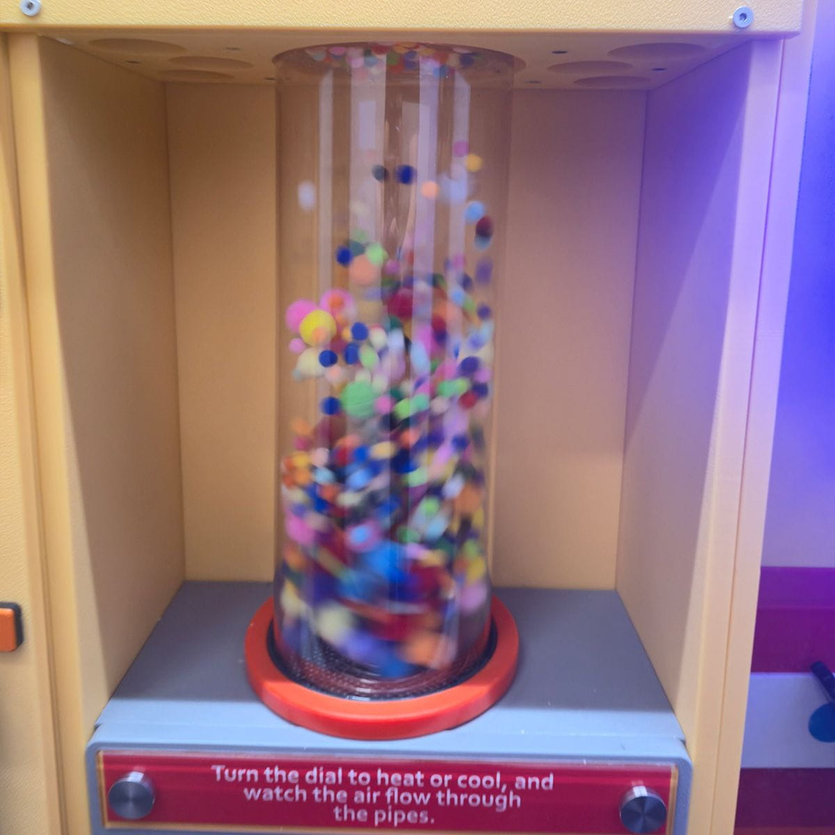 Air Powered LiteZilla PomPom Cyclone Interactive Tube with colored pompoms flying inside tube