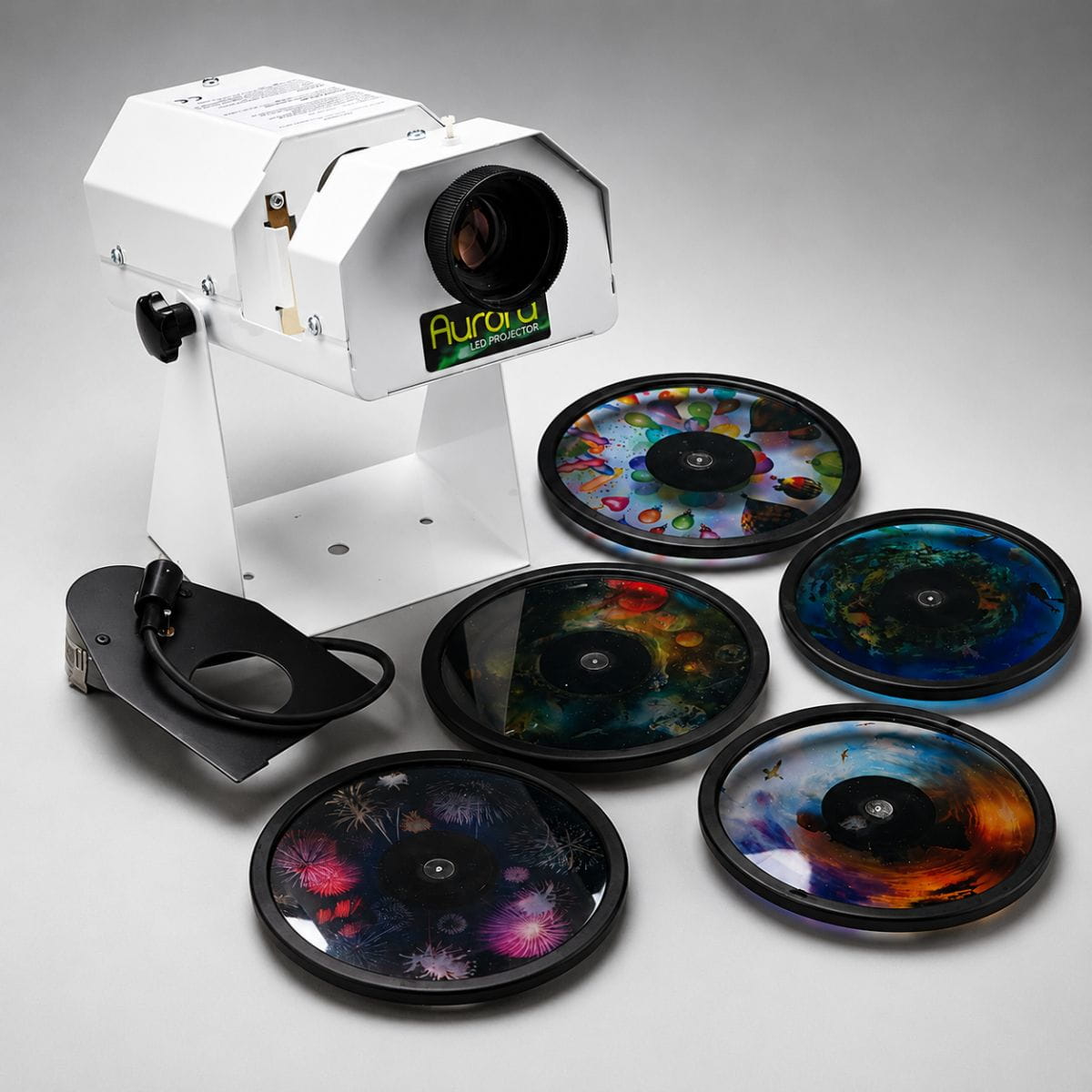 Aurora Projector Bundle with five Effects Wheels next to it