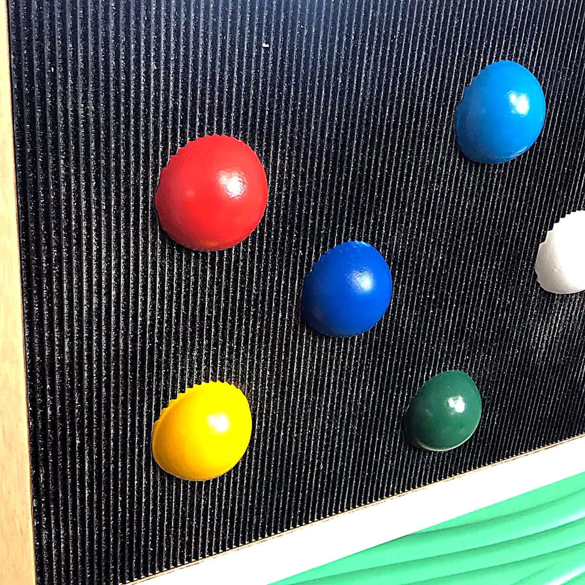 Balls on one panel of the Tactile Sensory Wall Panels
