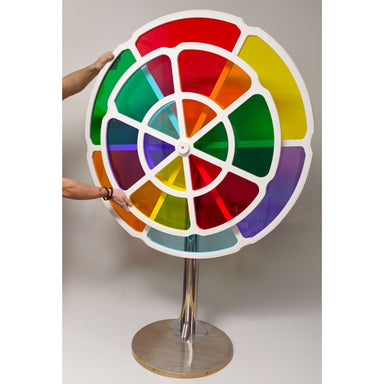 Both hands on the LiteZilla Chroma Wheel ready to spin it
