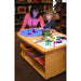 Child and adult playing with toys on the Koko Spectrum Light Lab table 