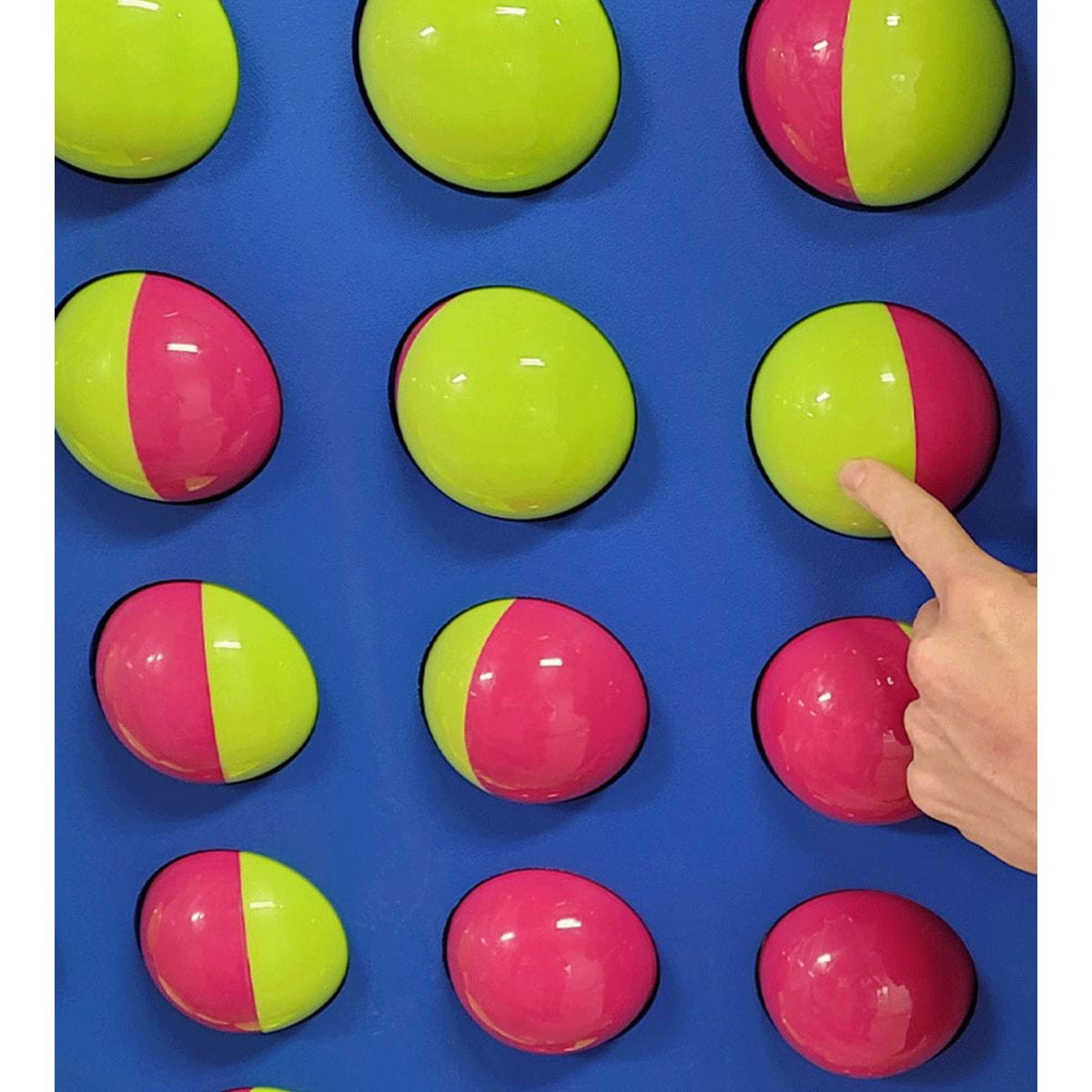 Closeup of the dual colored balls or spheres on the LiteZilla Spinfinity Whirly Wall 