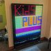 Design saying Kids Plus on the Black 4x5 LiteZilla Giant Light Wall 