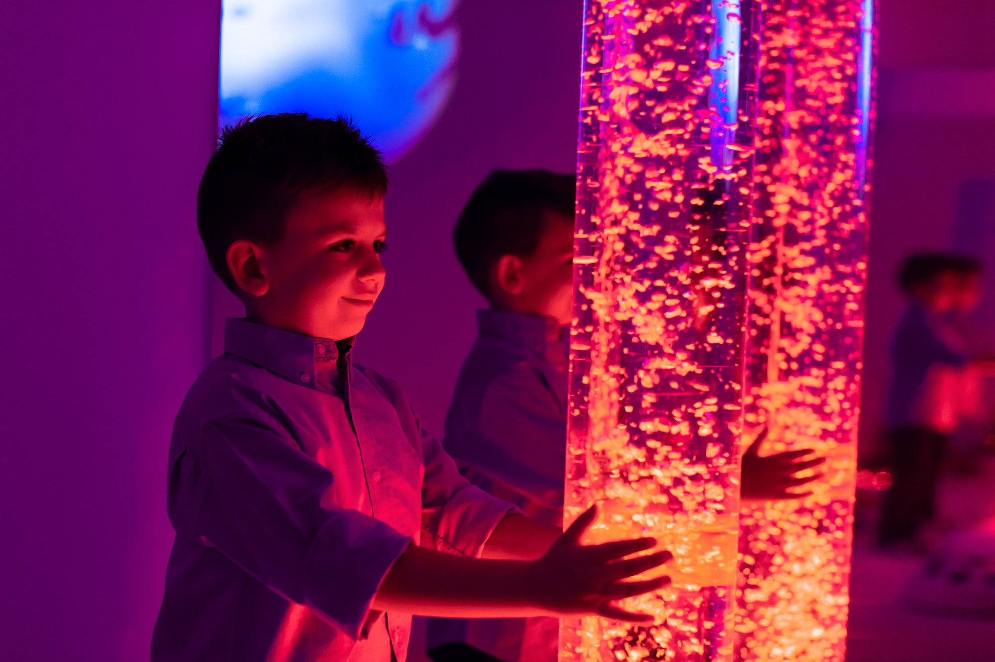 boy standing next to bubble tube epic elephant