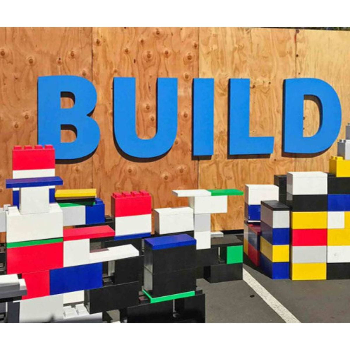 EverBlock Modular Building Blocks stacked with the word BUILD behind it