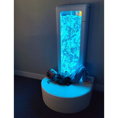 Experia USA Sensory LED Bubble Wall in blue with girl next to it looking up 