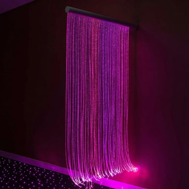 Fiber-Optic-Sensory-Light-Wall-Cascade-in-Pink-in-a-room