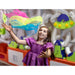 Girl catching a scarf in the air with the Ulitmate Scarf Launcher behind her
