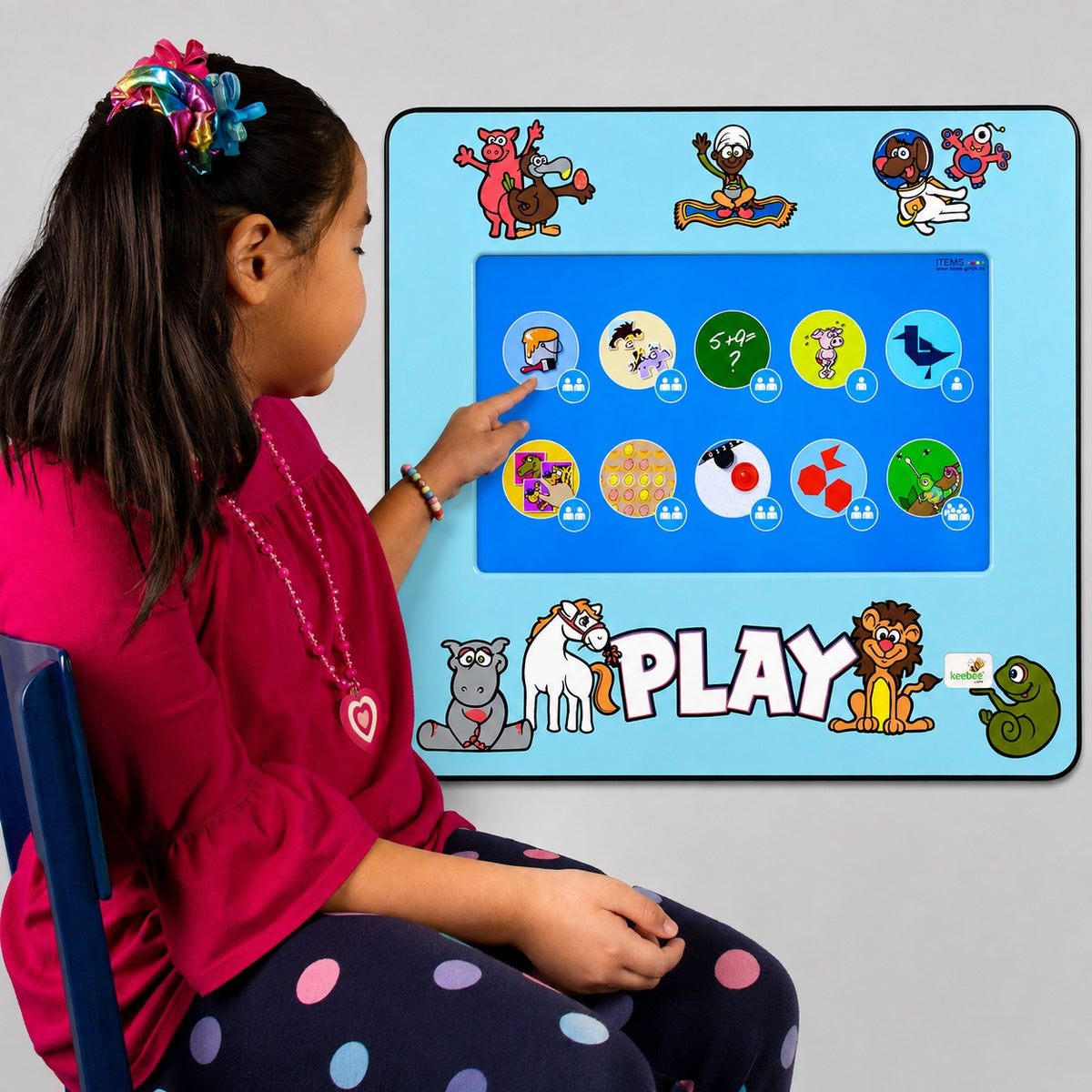 Girl choosing an option on the Keydo Interactive Touch Screen Wall Panel