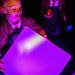 Girl playing with the purple LED Mood Light Square