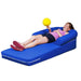 Girl with ball lounging in the Vibroacoustic Long Lounger