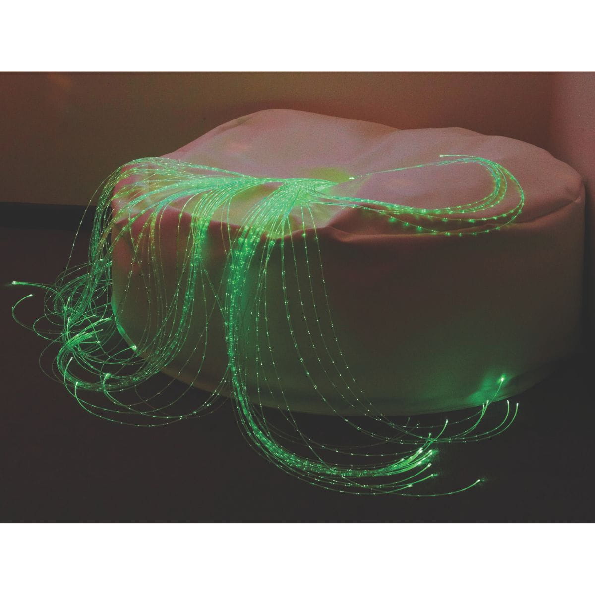 Green LED Fiber Optic Softie Bean Bag in the corner of a room