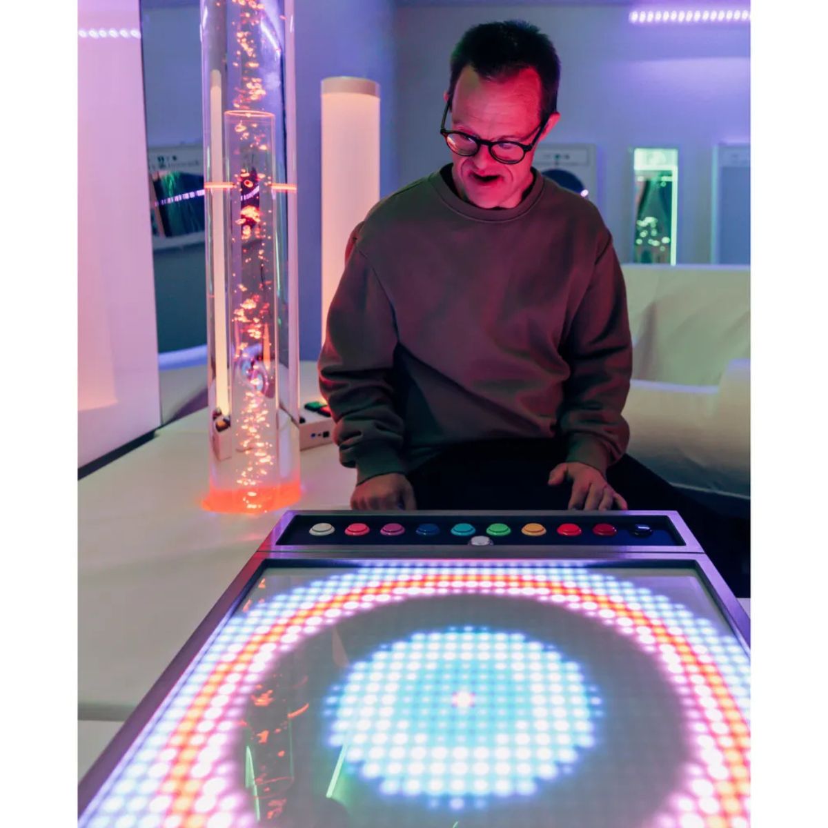 Guy creating a design on TFH Interactive Light Show