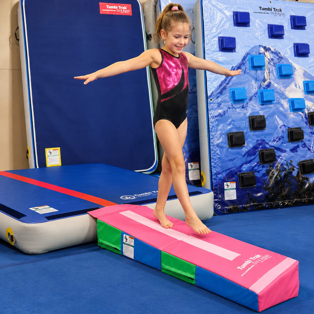 Gymnast using the Tumbl Trak Power Launch and extended beam