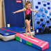 Gymnast using the Tumbl Trak Power Launch and extended beam