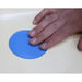 Hand touching the blue color switch on the Interactive LED Sensory Ball Pool