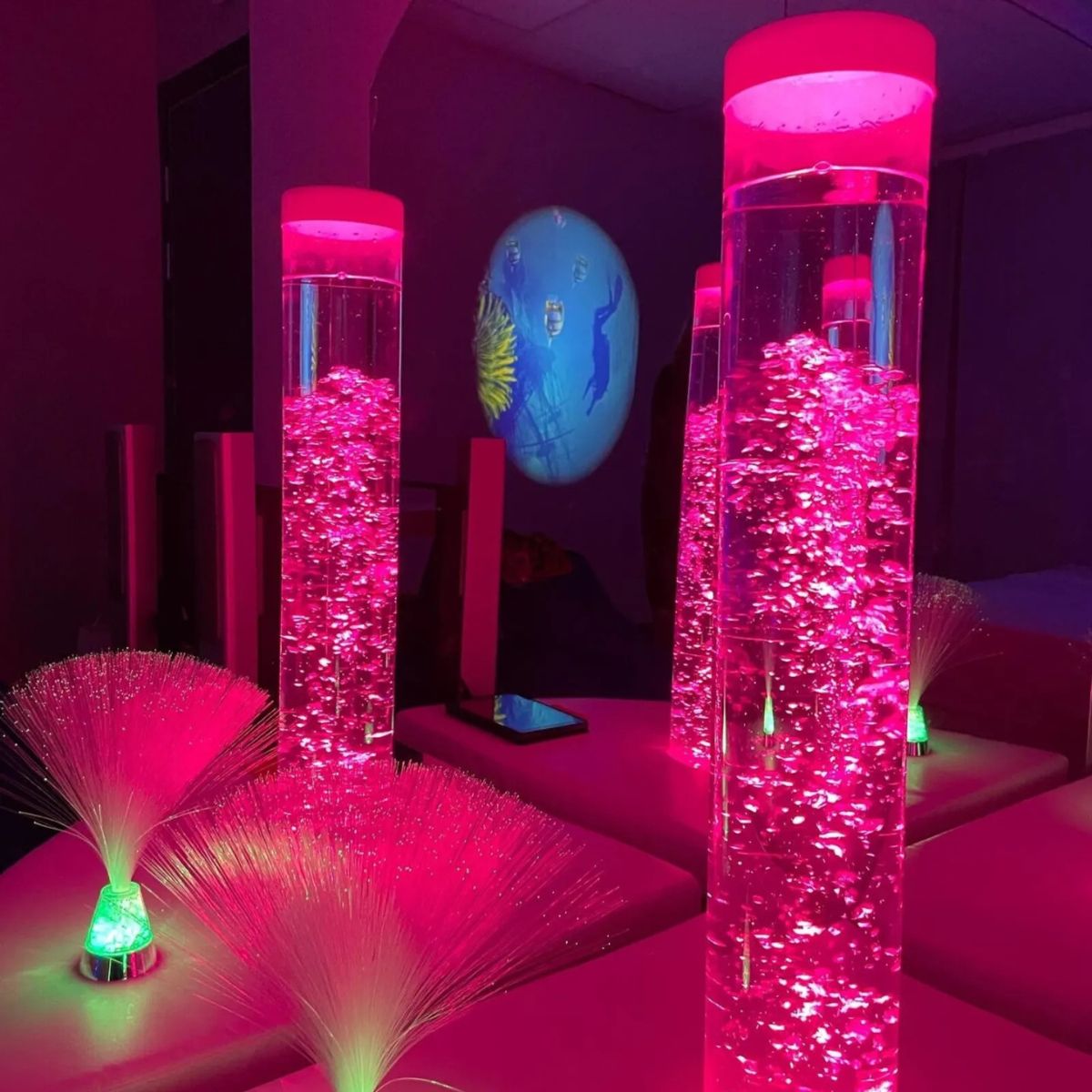 Interactive Bubble Tube next to other sensory toys