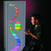 Kid Viewing the Sensory Ladder Lights Wave Stripe Panel