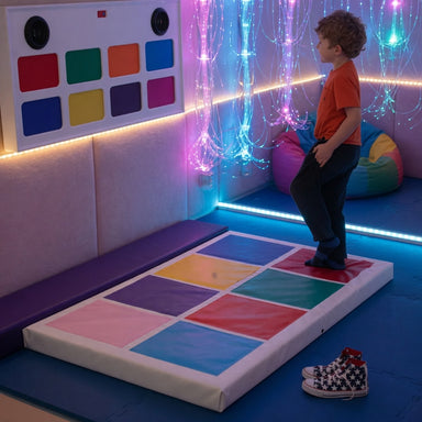 Kid Playing on the Musical Squares Sensory Game