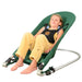 Kid harnessed in the Green Sensory Bouncy Chair