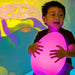 Kid holding the Sensory Mood Egg in his lap