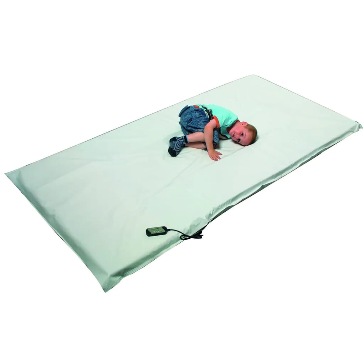 Kid laying on the Vibrating Sensory Mat