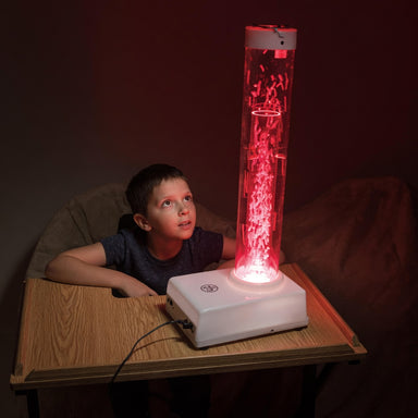 KidlookingupatthebrightredTFHTabletopHurricaneTubeEnhancedImage