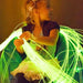 Kid playing with Interactive Fiber Optic Spray tails in green color