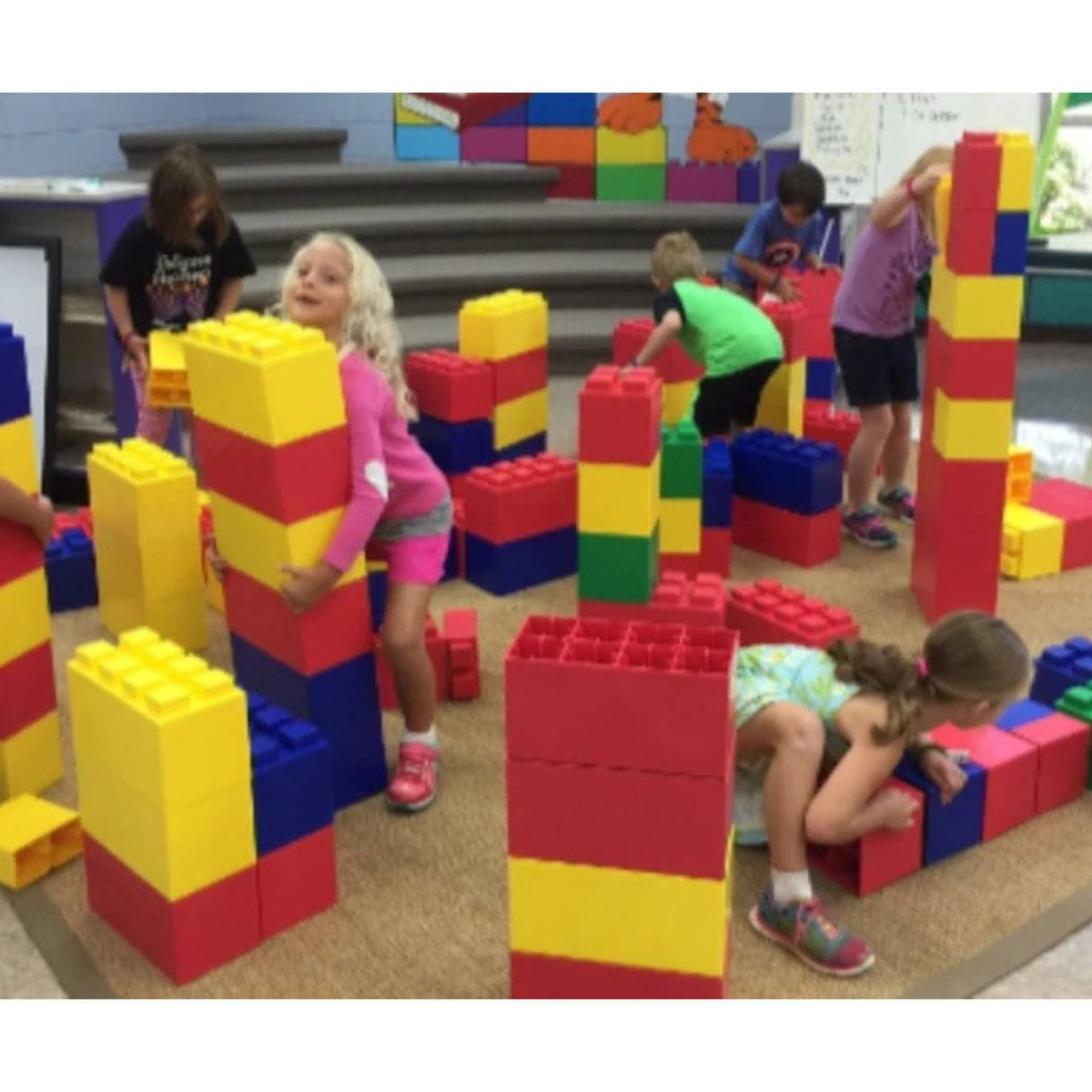 Kids playing with EverBlock Classroom Modular Building Block set in school