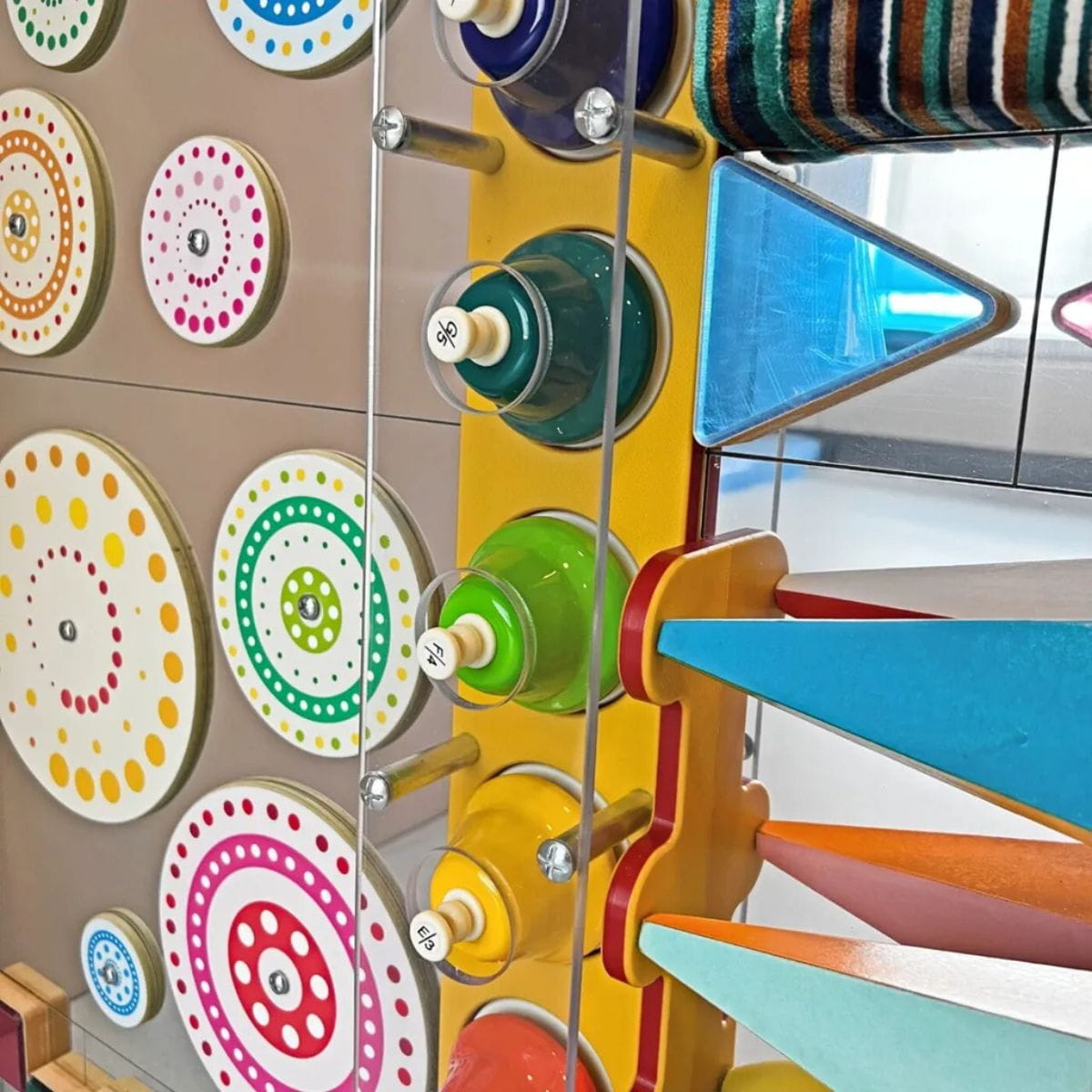 Kinetic Wonder Sensory Wall spinning discs and ringing bells