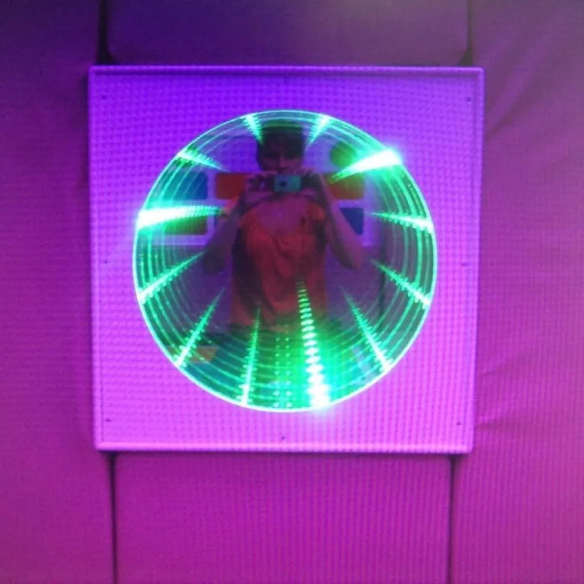 LED Infinity Tunnel Mirror with reflection of persion in