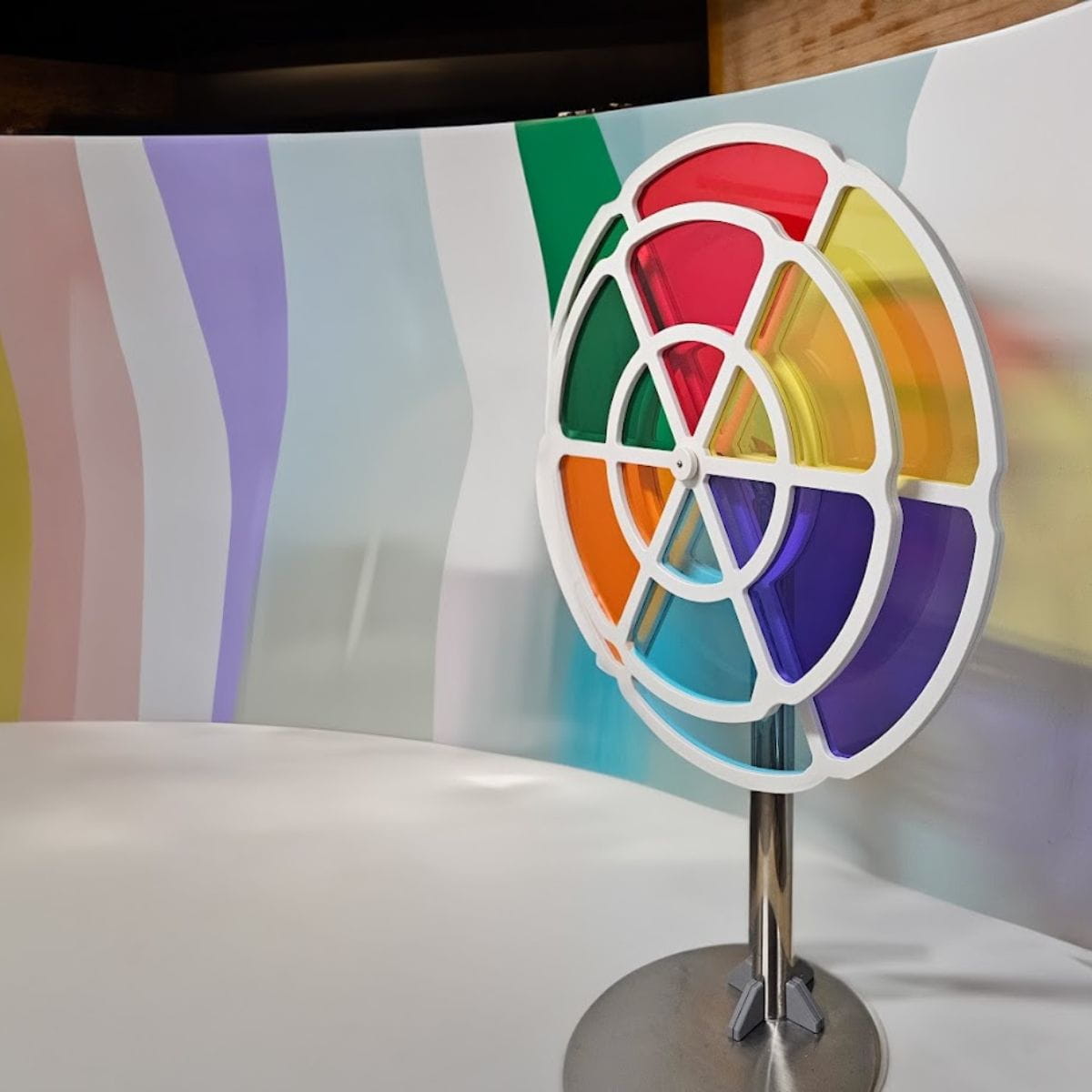 LiteZilla ChromaWheel in front of a colorful wall