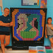 LiteZilla Light Wall 4x5 in Black with two females standing next to their design