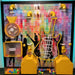 LiteZilla Ultimate Ball Launcher with a guitar figure and silhouettes of kids as the background