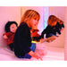 Little girl in the Portable Sensory Den with her doll and reflection in the mirror