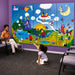 Mother and daughter enjoying the Harmony Park Kids Themed Wall Mural in a waiting room
