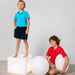 One kid standing on LED Dice next to kid holding the LED Egg Light