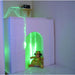 Portable Sensory Den with doll by opening and green light emitting from inside