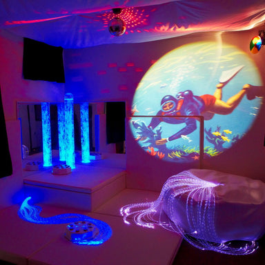 Premium Sensory Room Package with blue and purple light on the bubble tube and fiber optics and scuba diver on projector