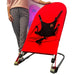 Sensory Bouncy Chair in Red with next to a person standing