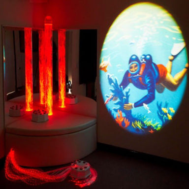 Sensory Corner bundle with image under the sea on wall from Aurora LED projector and bubble tube and Fiber optics lit up in red