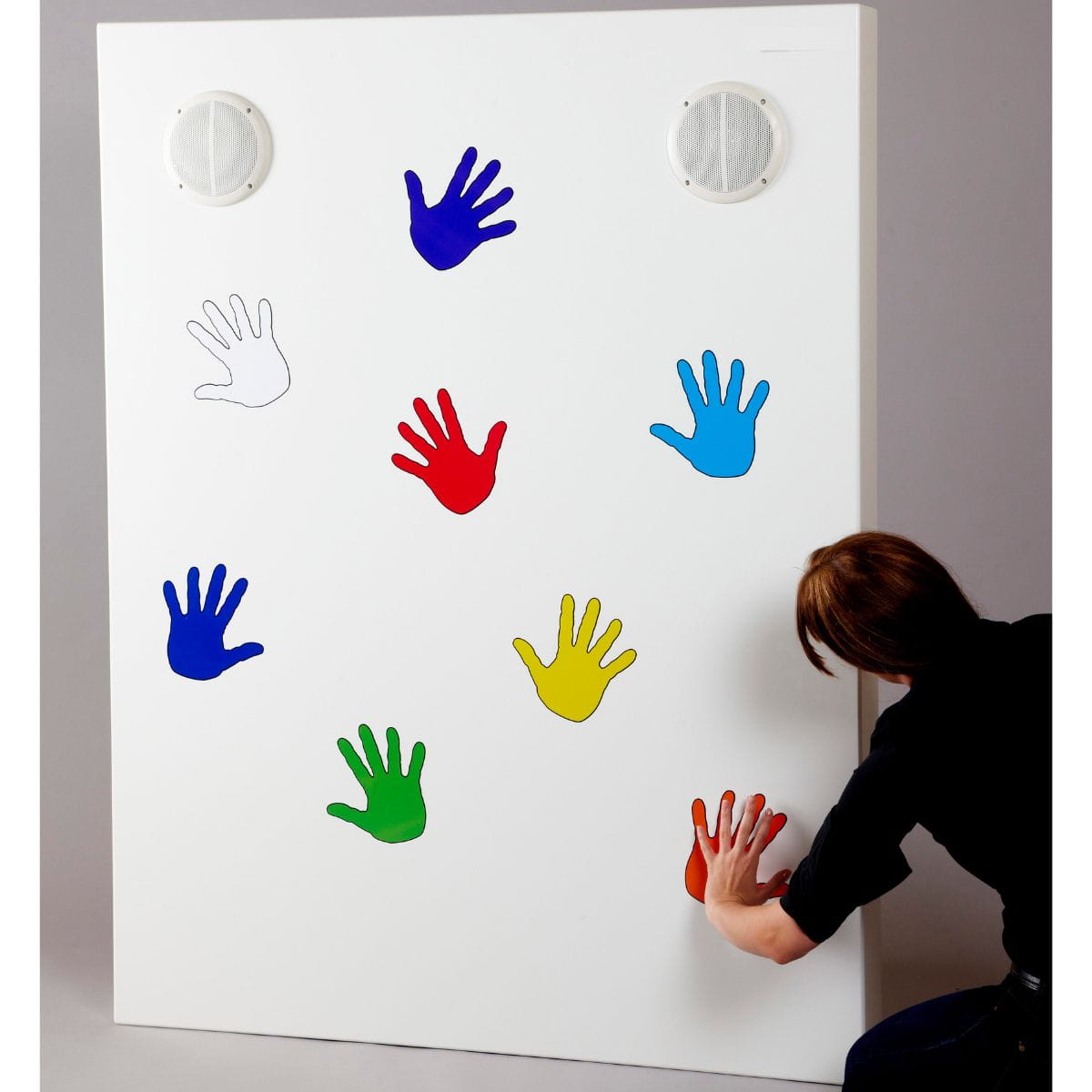 Sensory Sound Wall Panel with someone touching the red hand on the wall to make sound