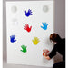 Sensory Sound Wall Panel with someone touching the red hand on the wall to make sound