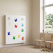 Sensory Sound Wall Panel mounted on wall next to a window and chairs