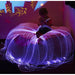 Superactive Sensory Room Bean Bag with  Kid in it holding LED Fiber Optic strands