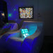 TFH LED Laser Star Projector in room with other sensory objects