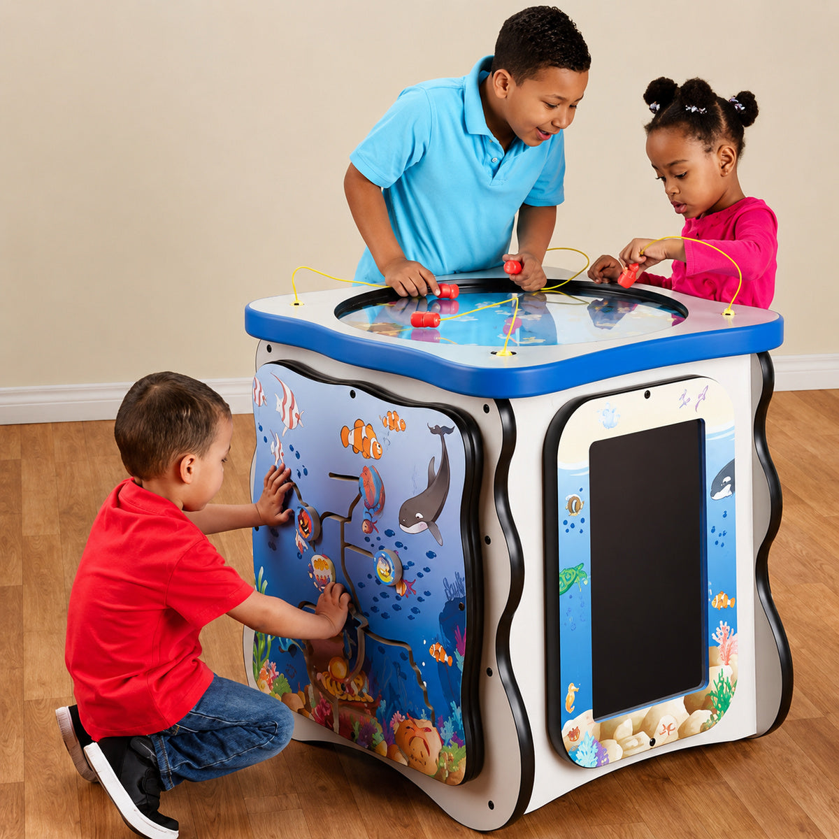 Three kids playing on the Kids Seascape Activity Island Play Cube
