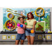 Two kids holding the balls in front of the LiteZilla Ulitmate Ball Launcher