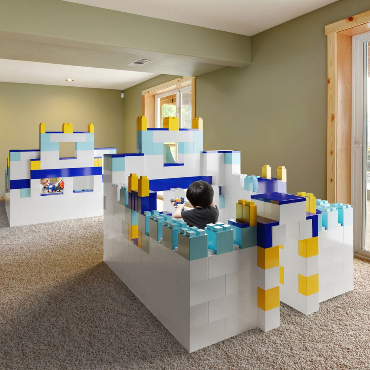 Two kids in forts made from the Large Set of EverBlock Modular Building Blocks